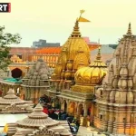 काशी विश्वनाथ मंदिर में महाशिवरात्रि पर असमिया परिधान में सजे बाबा विश्वनाथ और माता गौरा