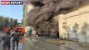 लखनऊ विभूतिखंड होटल ताज में आग लगने के बाद धुएं से घिरा परिसर