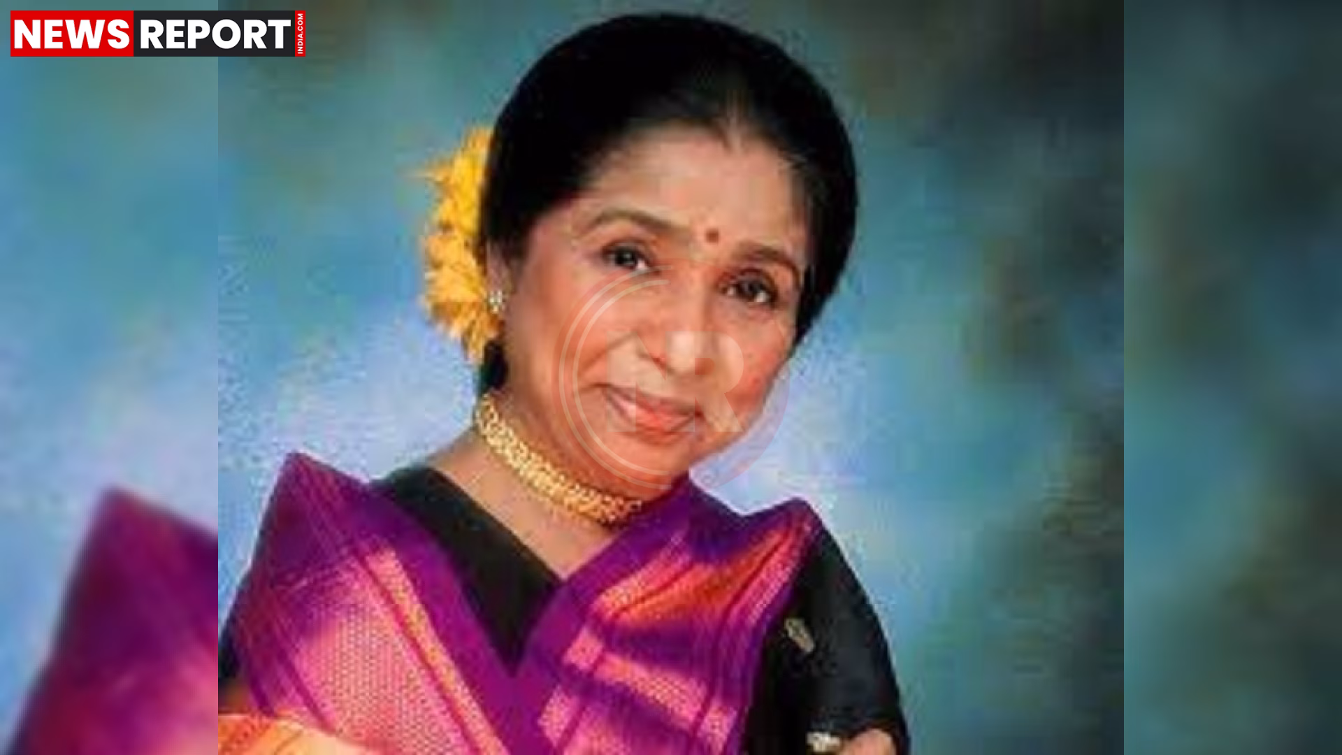 महान गायिका आशा भोसले की एक मुस्कुराती हुई तस्वीर