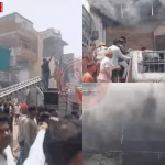 वाराणसी के राजातालाब में जलते कपड़े और कोल्डड्रिंक के गोदाम की तस्वीर