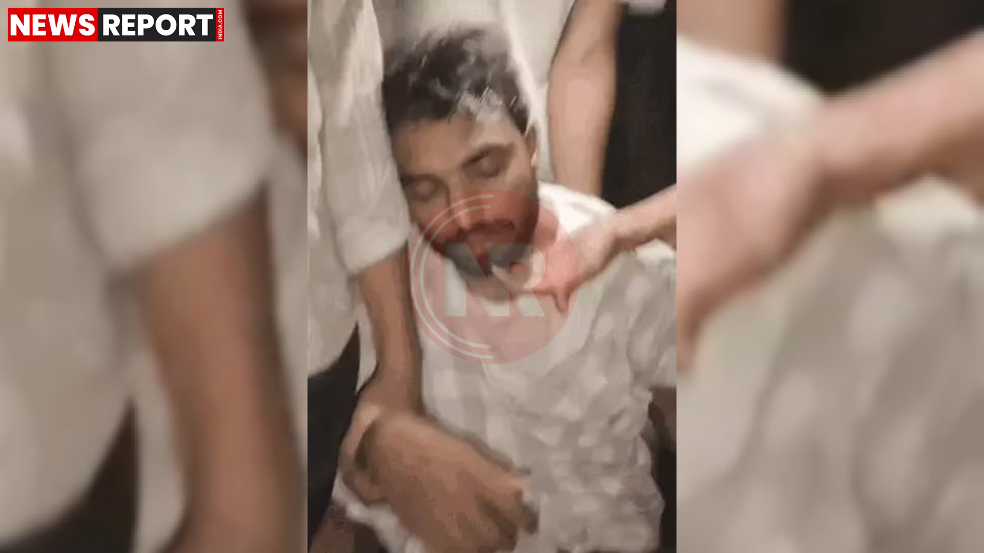एक व्यक्ति को पुलिस या भीड़ द्वारा पकड़े हुए और पिस्टल बरामद करते हुए दिखाया गया है।