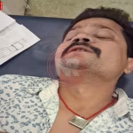 अस्पताल में इलाज करा रहे घायल भाजपा नेता पम्मी गोस्वामी की प्रतीकात्मक तस्वीर