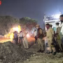 वाराणसी में अजगैब शहीद मस्जिद के ध्वस्तीकरण के बाद का मलबा और बुलडोजर