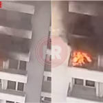 नोएडा की आईवीवाई काउंटी सोसाइटी में ऊंची मंजिल से आग की लपटें और घना धुआं निकलता हुआ