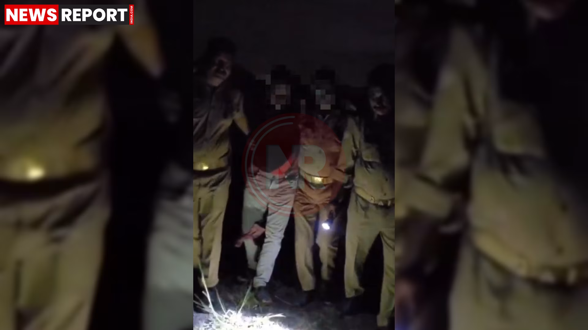 वाराणसी में पुलिस मुठभेड़ के बाद घायल बदमाश को अस्पताल ले जाते पुलिसकर्मी
