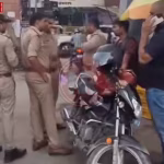 वाराणसी में रैपिडो चालक से युवती के विवाद और पुलिस कार्रवाई को दर्शाती तस्वीर।