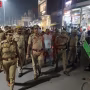 रामनगर में कांवड़ यात्रा के लिए अतिक्रमण हटाता पुलिस दल