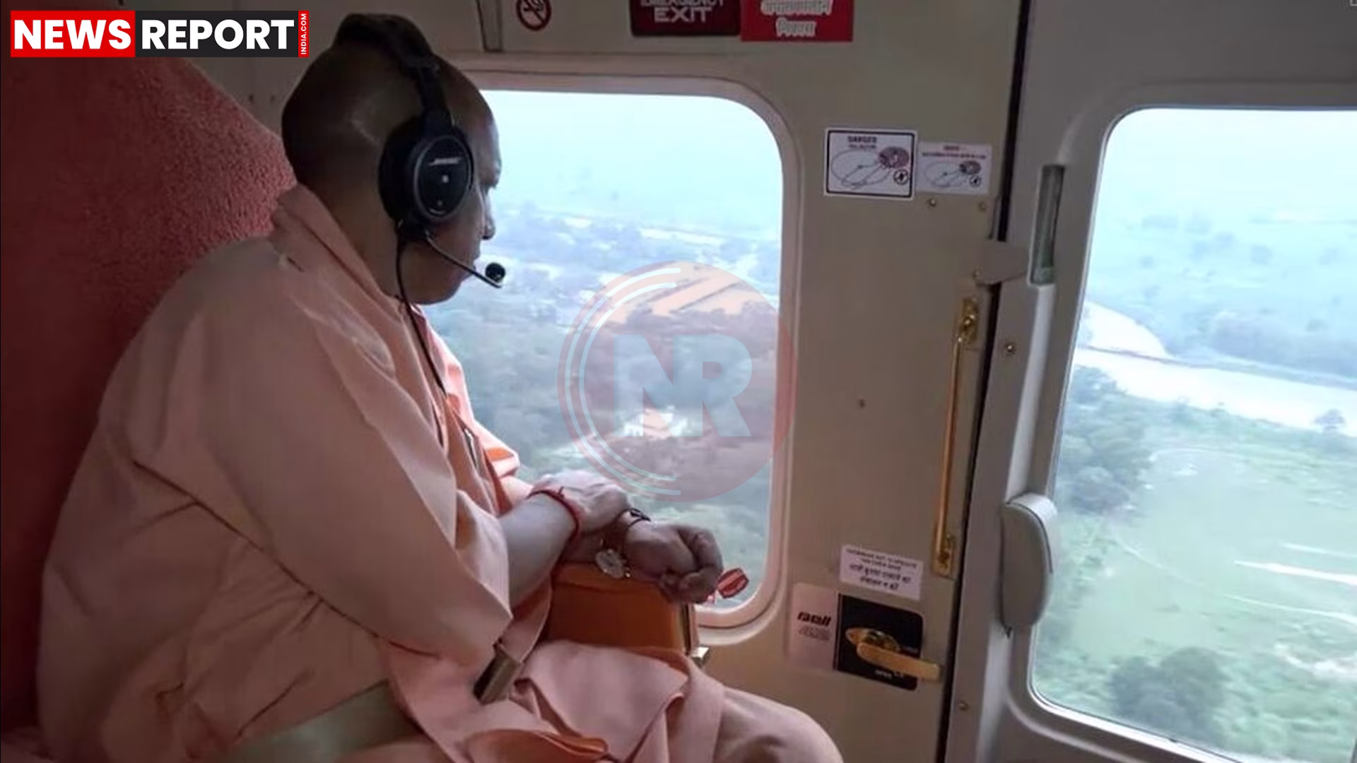 मुख्यमंत्री योगी आदित्यनाथ हेलीकॉप्टर से वाराणसी में बाढ़ प्रभावित क्षेत्रों का हवाई सर्वेक्षण करते हुए।